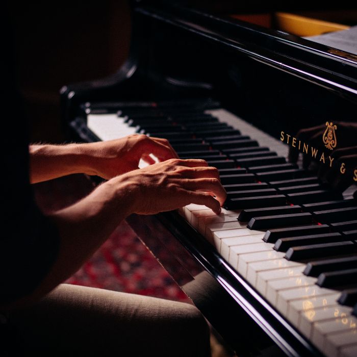 Person playing Steinway & Sons Piano